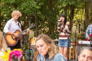 Music fills the air as a band entertains guests at the annual harvest party hosted by Halleck Vineyard at their Sebastopol Estate in Sonoma County. The event showcases the winery's premium wines and allows visitors to experience the beauty of the vineyard during harvest season. With live music, delicious food, and of course, great wine, this harvest party is a must-attend event for any wine enthusiast.