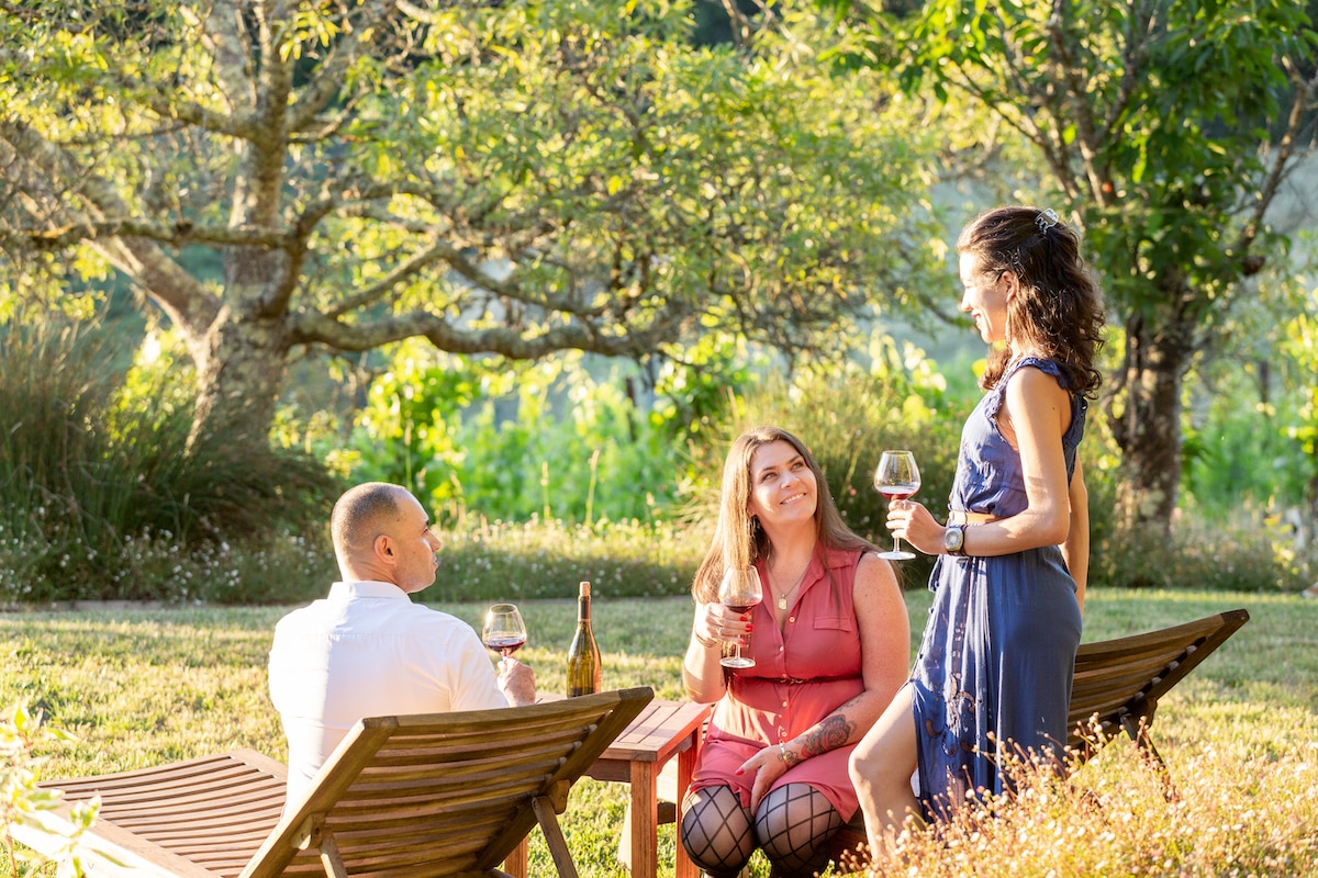 Sip Sonoma wines in the garden at our estate vineyard.